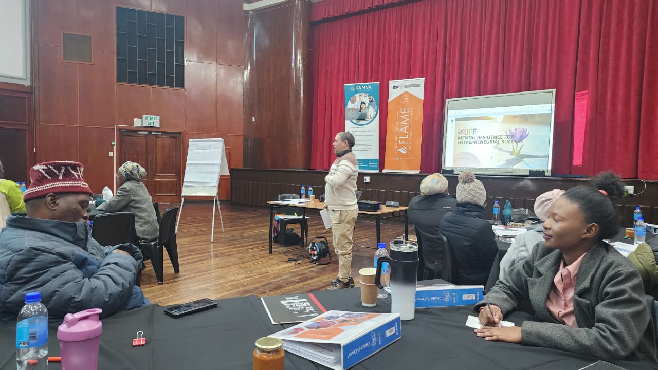 Person presenting in front of a whiteboard